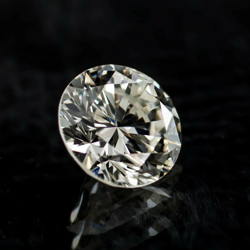 0.58 Carat Loose J/ VS2 Round Brilliant Cut Diamond GIA Certified