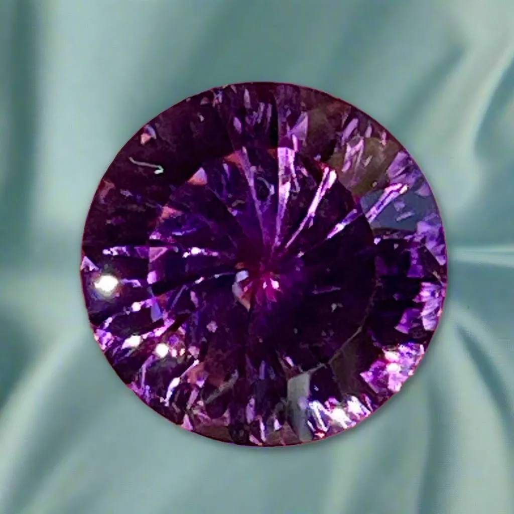 Amethyst, 8.60 carat Fantasy Portugese Cut, African, Red Flash, Lowest Price Ever.