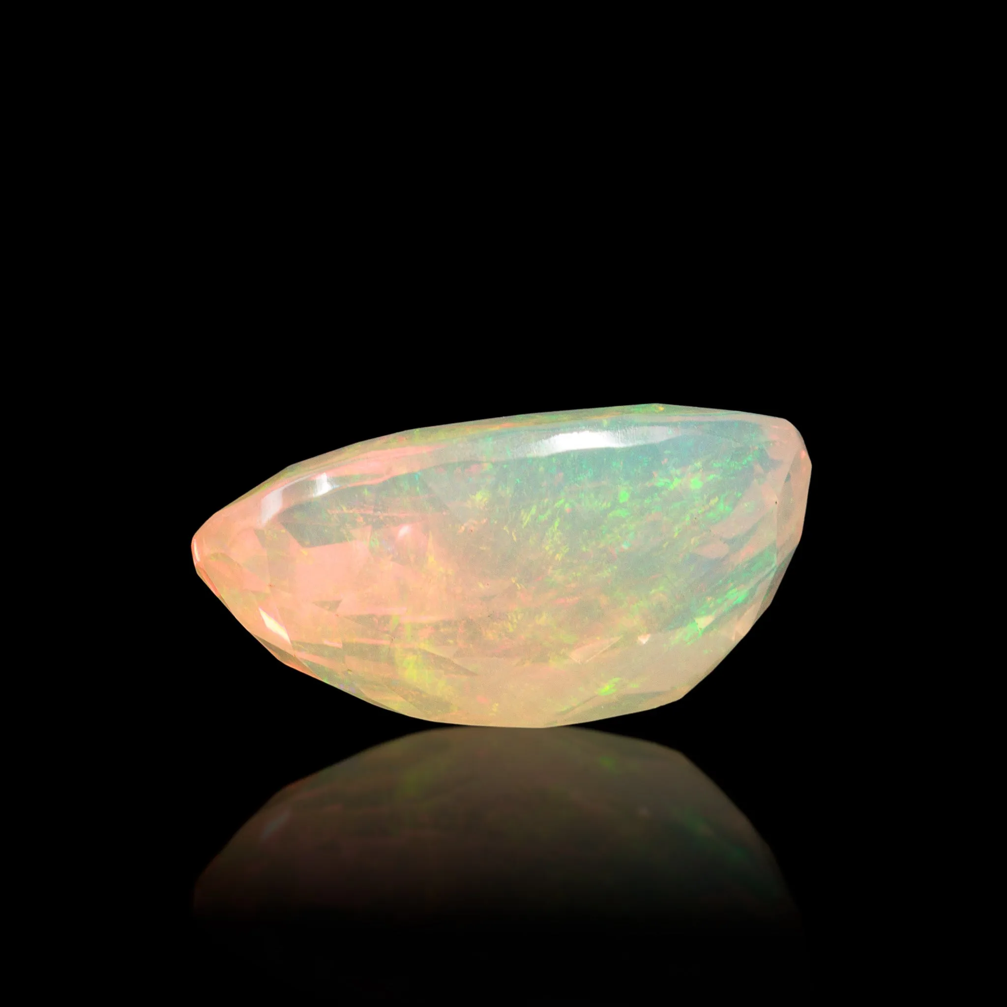Fire Opal 7.91 Carat Faceted Gemstone - Mexico