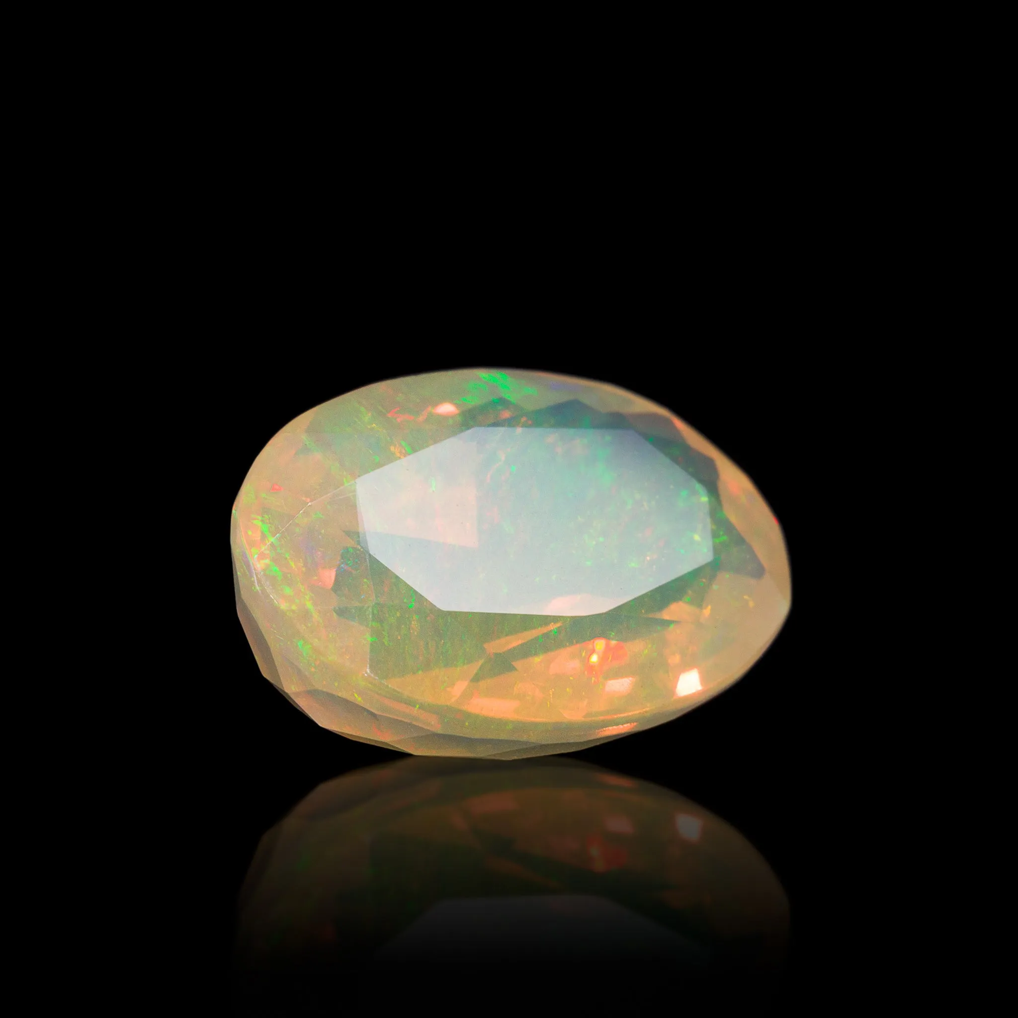 Fire Opal 7.91 Carat Faceted Gemstone - Mexico