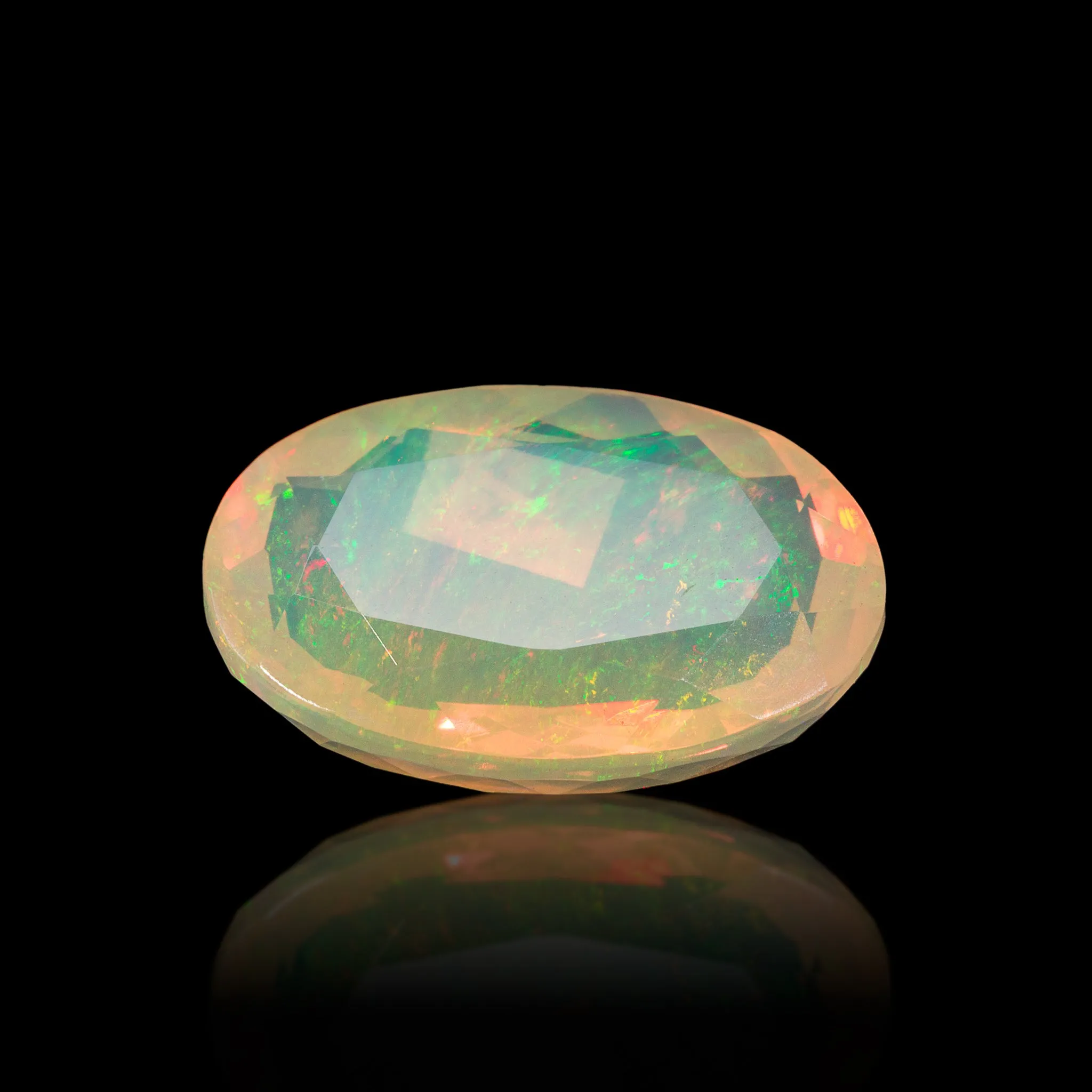 Fire Opal 7.91 Carat Faceted Gemstone - Mexico