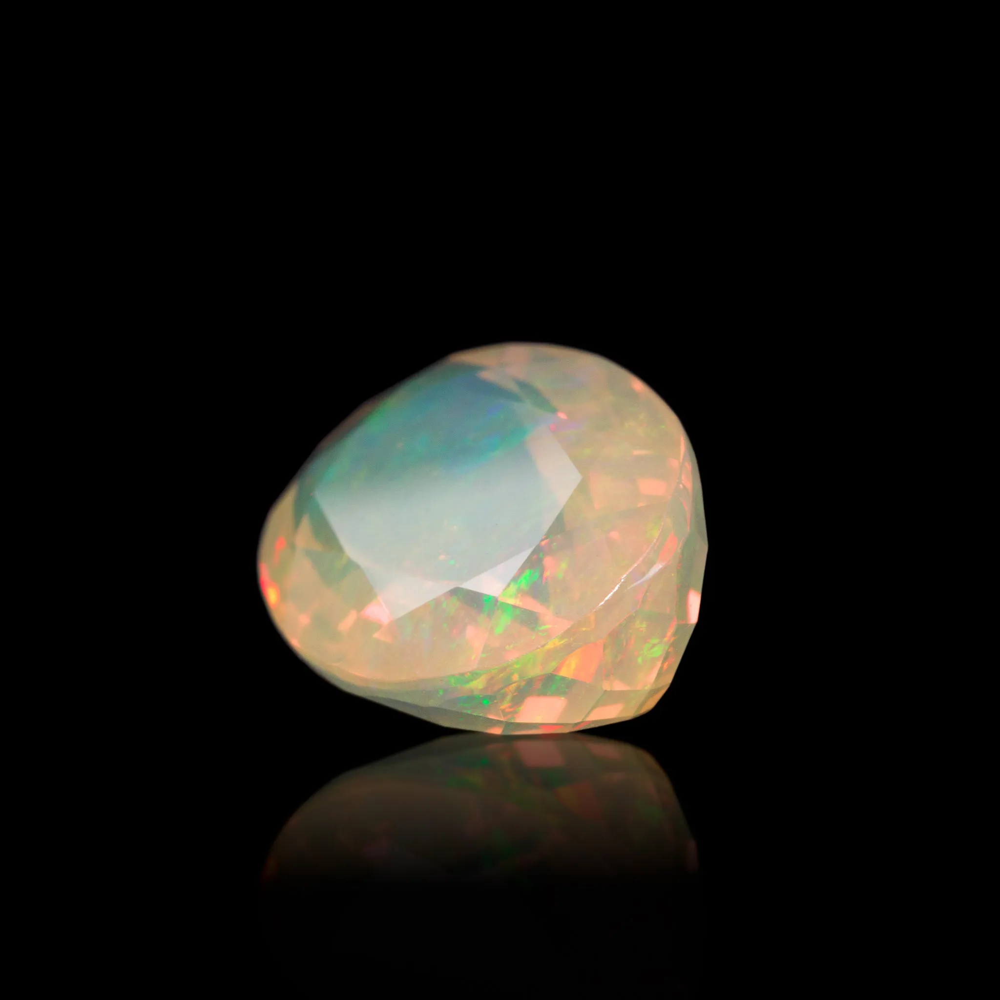 Fire Opal 7.91 Carat Faceted Gemstone - Mexico