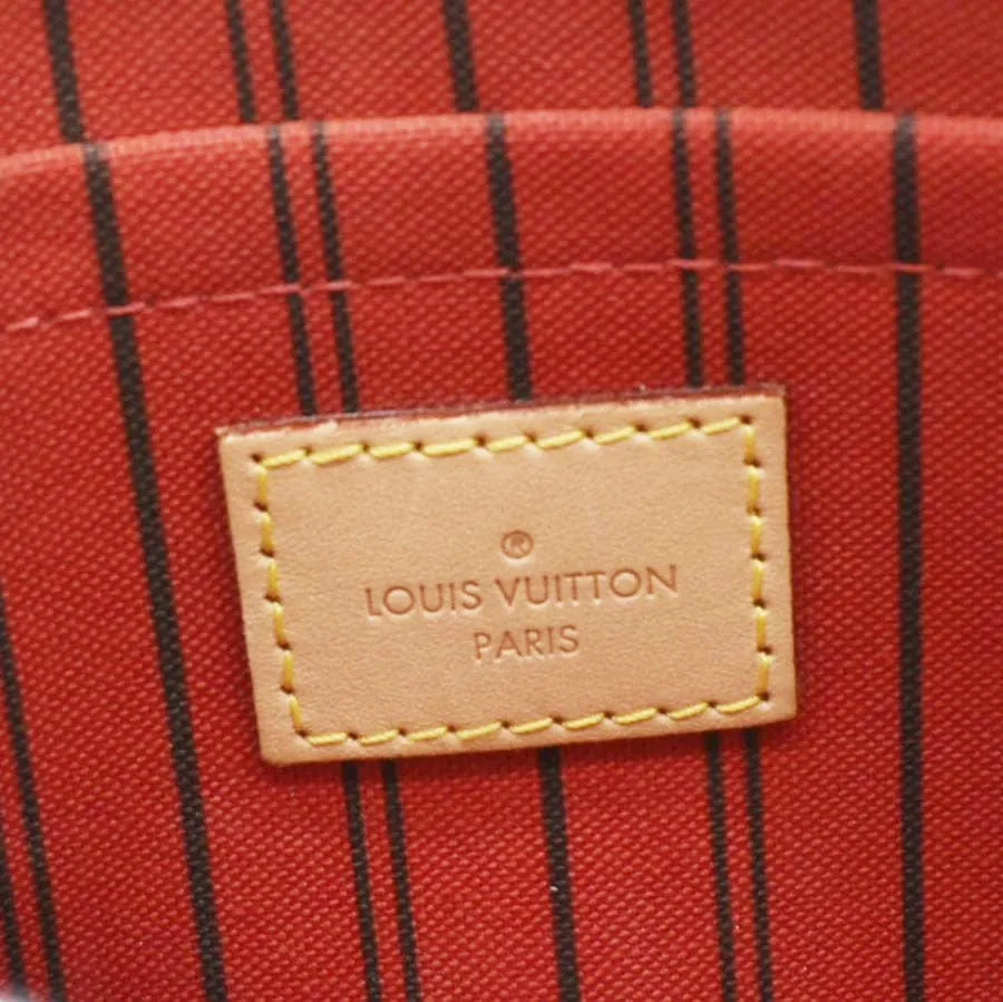 LOUIS VUITTON  Monogram Canvas Wristlet Pouch Brown