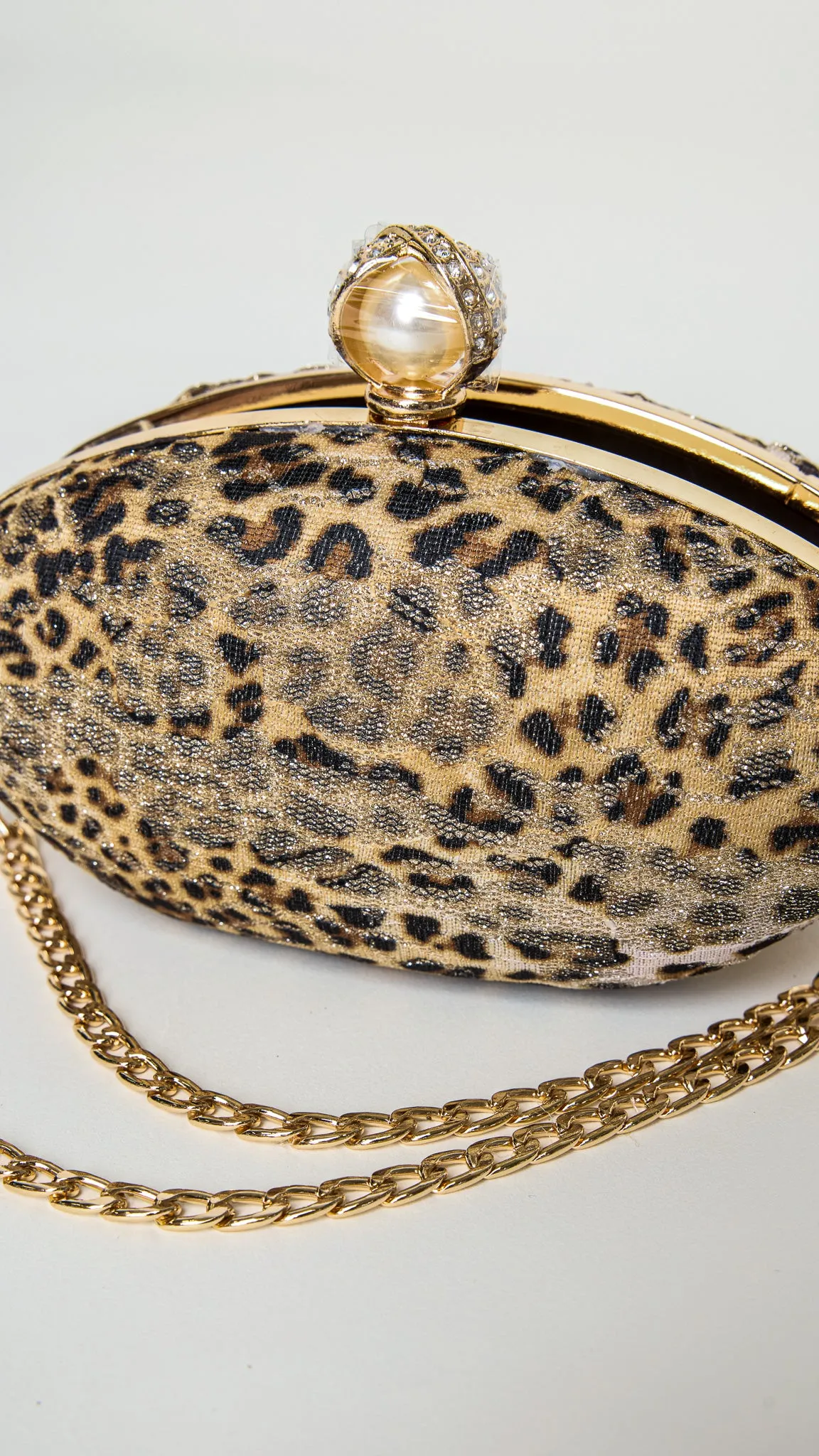 Mara Gold-Accessorized Leopard Print Clutch