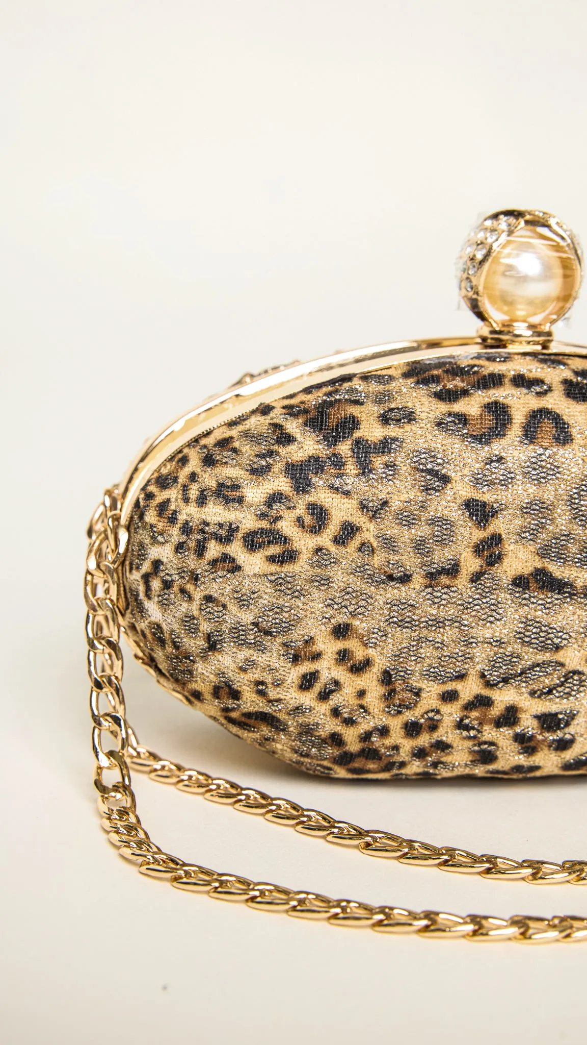 Mara Gold-Accessorized Leopard Print Clutch
