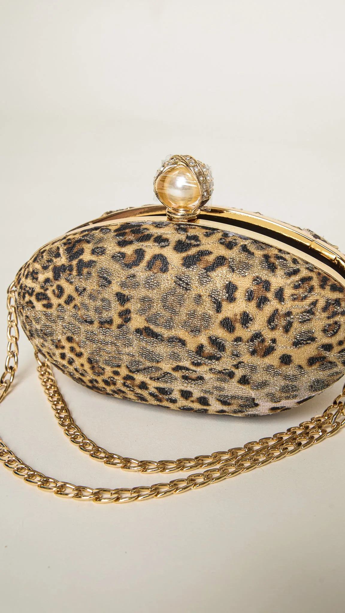 Mara Gold-Accessorized Leopard Print Clutch