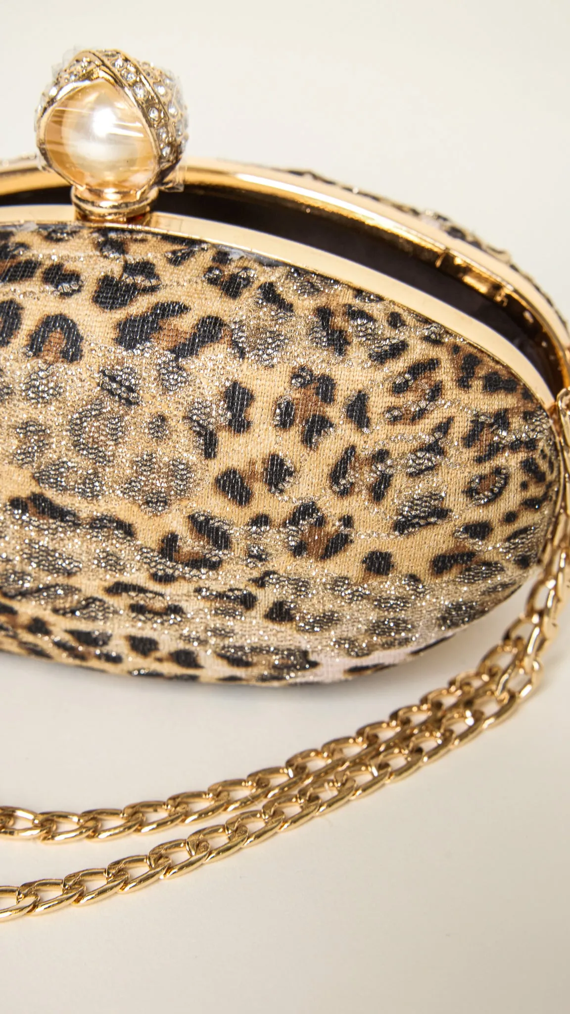 Mara Gold-Accessorized Leopard Print Clutch