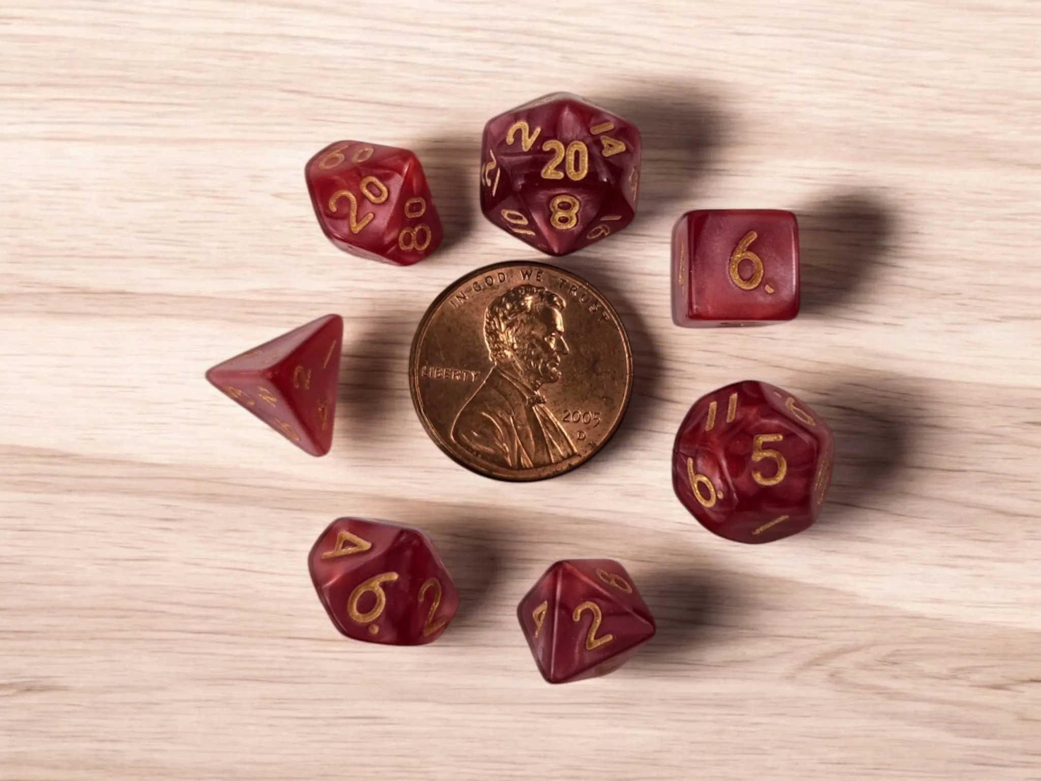 Mini dragon drawstring bag with a set of mini dice, dark red dice
