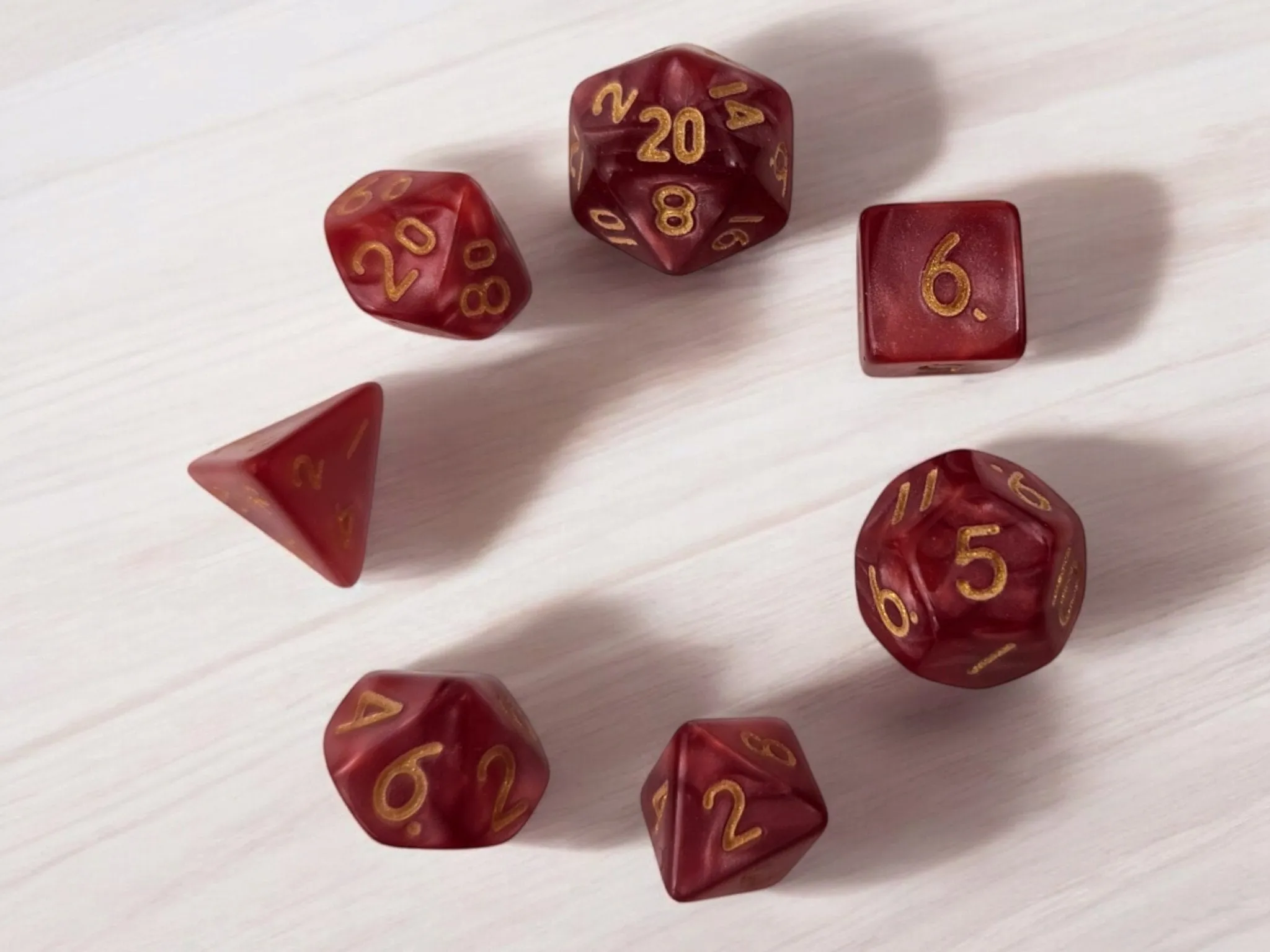 Mini dragon drawstring bag with a set of mini dice, dark red dice