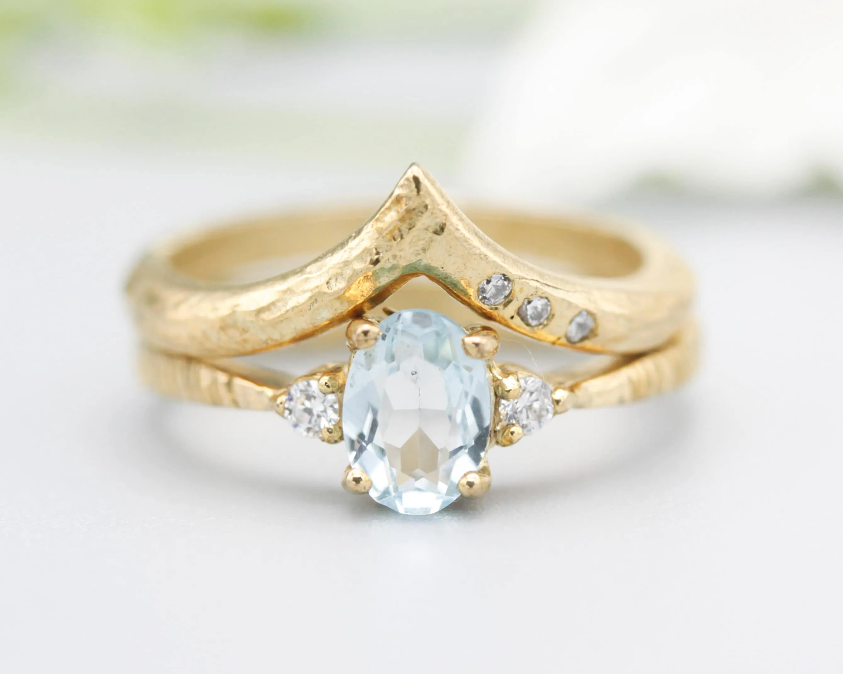Set of 2 Oval faceted blue topaz ring with tiny round diamonds side set with 14k gold band set with 14k gold band ring with tiny 3 diamond