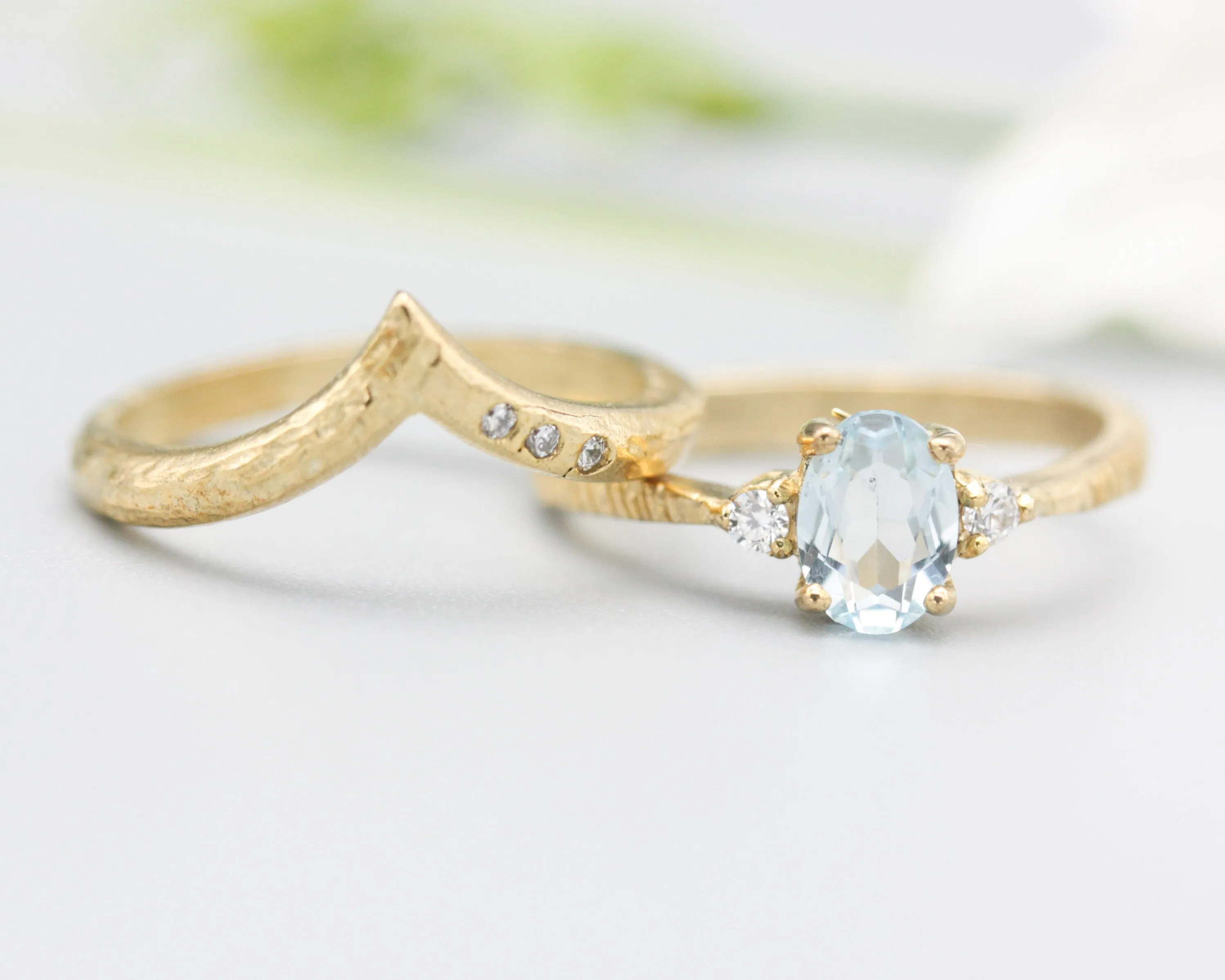 Set of 2 Oval faceted blue topaz ring with tiny round diamonds side set with 14k gold band set with 14k gold band ring with tiny 3 diamond
