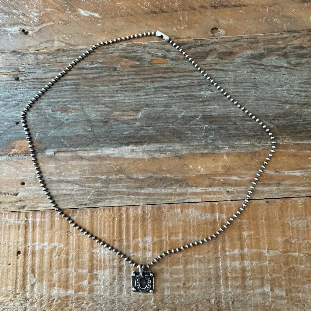 Tiny Horseshoe Necklace
